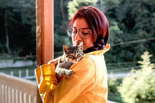 Woman holding cat