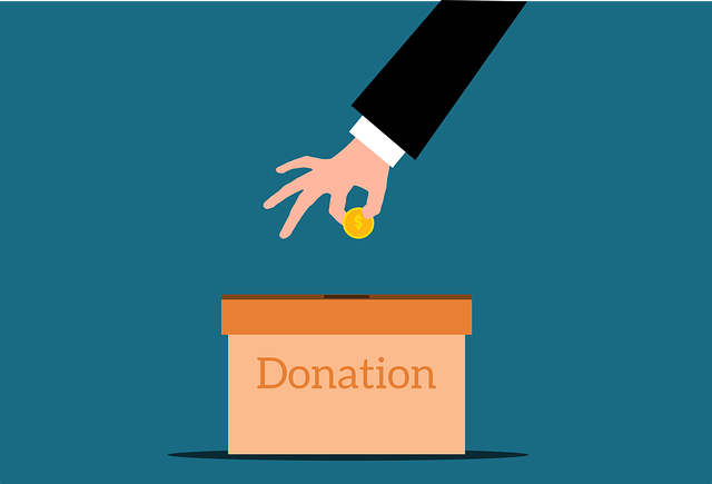 Illustration shows hand placing money in donation box