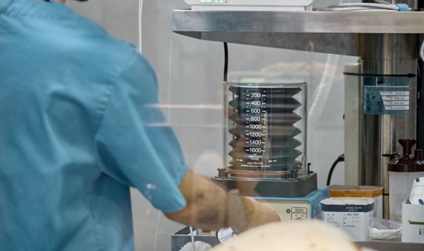 Surgeon uses medical machinery