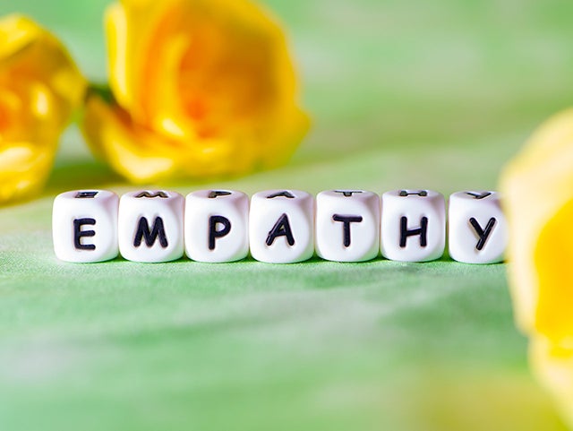 White beads spell out EMPATHY